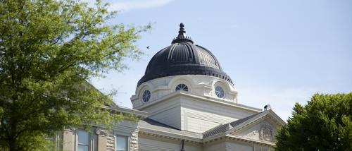 Academic Hall on a sunny day with a focus on the dome of the building.